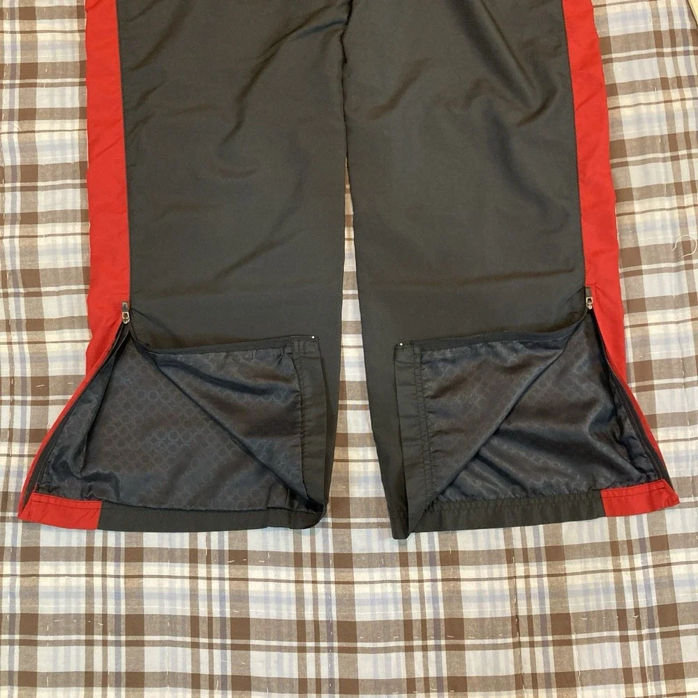 Under Armour Pants Men Medium M Windbreaker‎ Red Black Zip Ankles Stretch Track